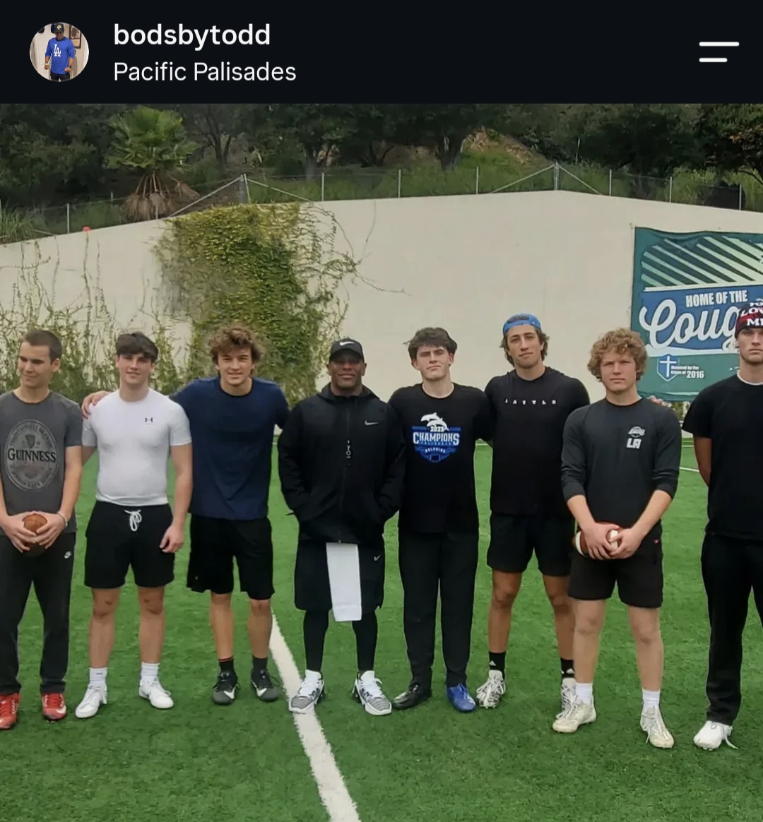 Coach Todd working with young athletes